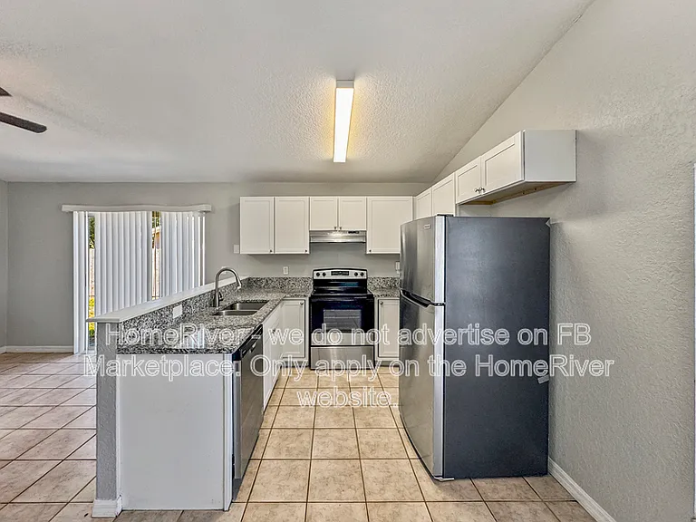 6033 Flora Ter — Photo 9