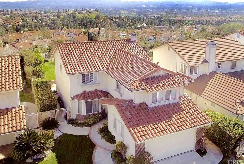 Incredible curb appeal with immaculate landscaping