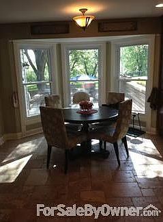 Eat-in kitchen overlooking back yard