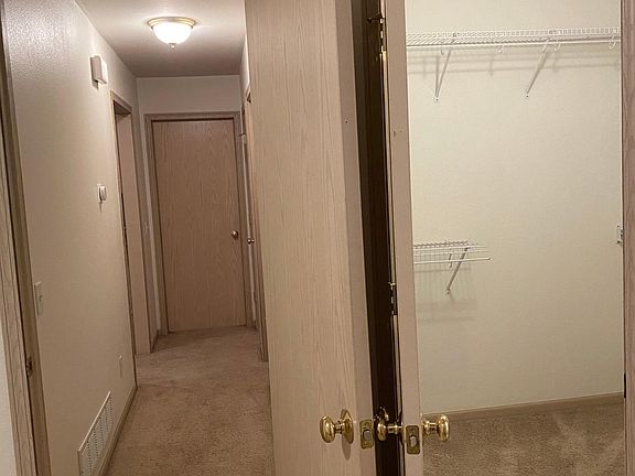 hallway and master walk-in closet (towards the right)