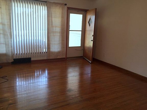 Living room with hardwood floors.