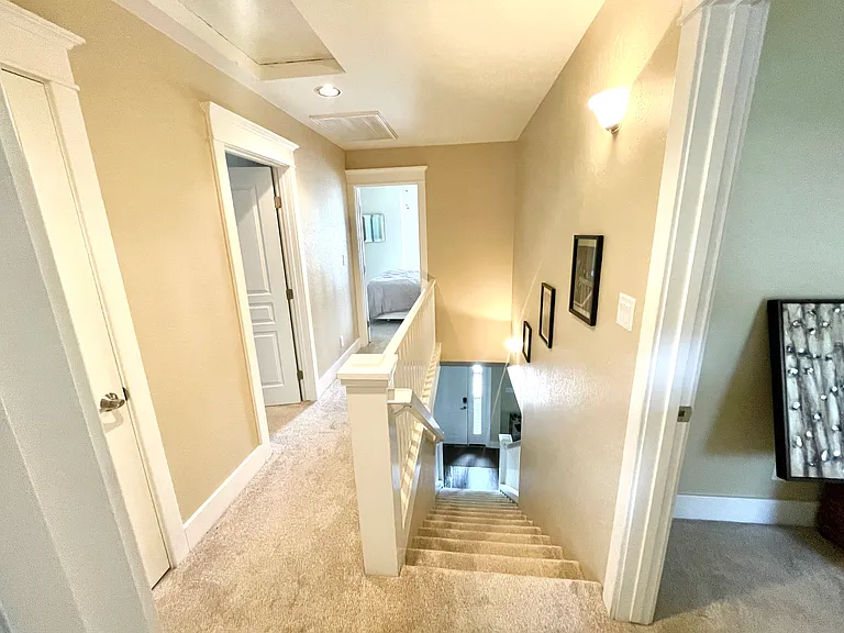 Hallway and stairs to the bedroom