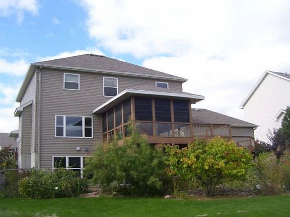 walkout lower level, elevated screened porch, and large two tiered deck