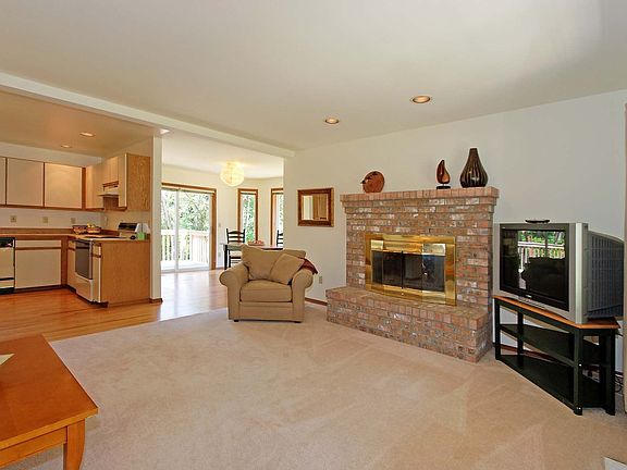 Large open living/dining with fireplace