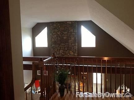 Beautiful Stone fireplace
						:
						Open main level floor plan includes kit, dining, living room, bedroom and bath