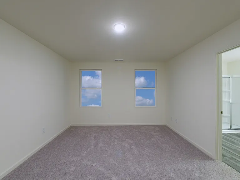 Ensuite bedroom . Carpet replaced with LVP