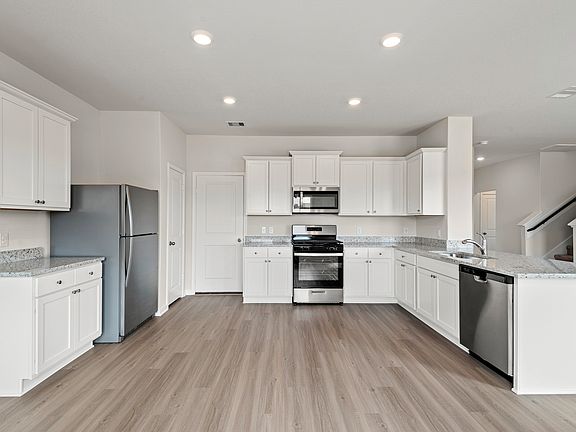 A chef-ready kitchen with granite countertops