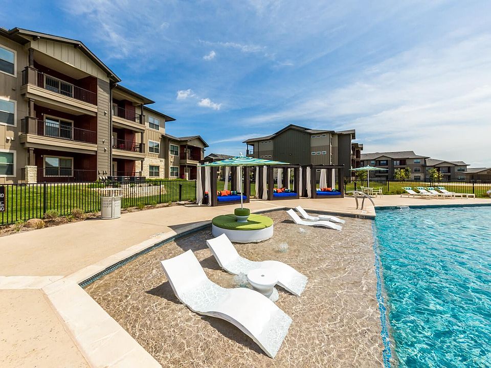 Resort Style Pool with Cabanas & Pool Loungers