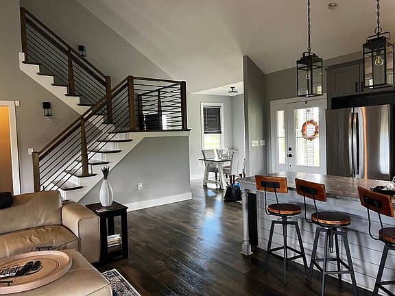 Kitchen and stairs to 2 more bedrooms and full bathroom.