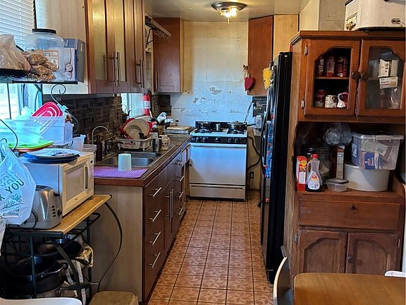5th image of 2623 E 127th St