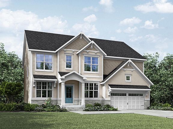 two-story home with siding and shakes