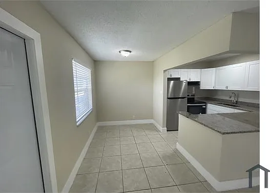 207 NW 32nd Ct #211 — Photo 24