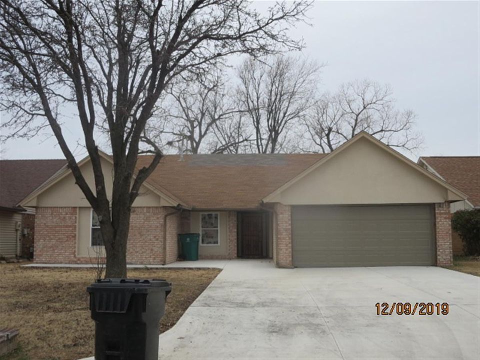 Front house new driveway concrete with big parking