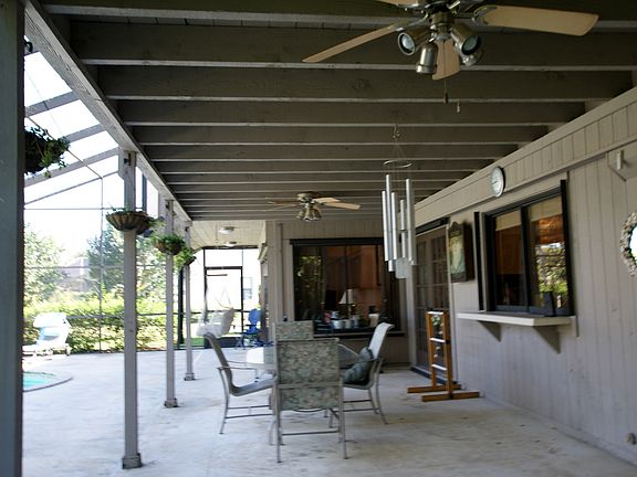 Large patio overlooking the pool.