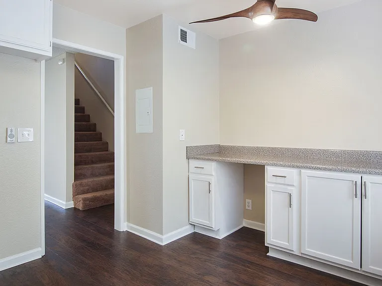 Granite counter tops and carpeted stairs