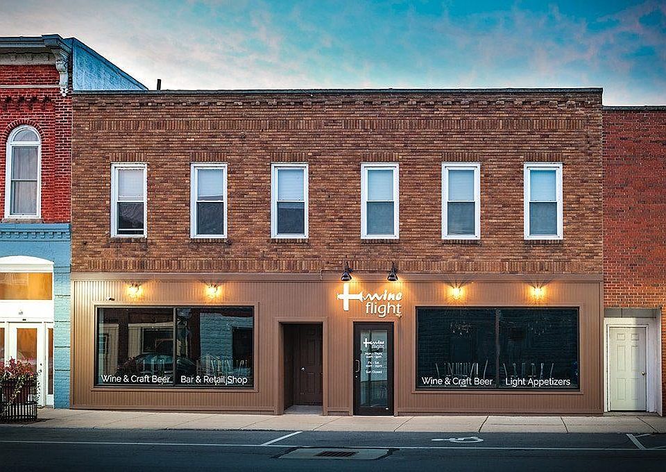 Front of building. This apartment is the left 3 windows abov