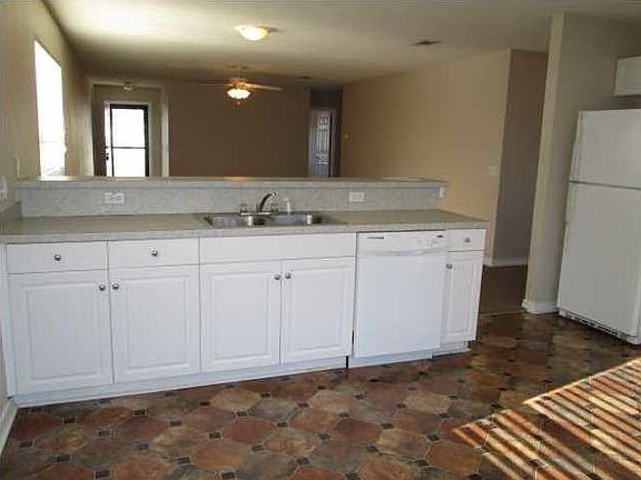 Kitchen overlooks living area