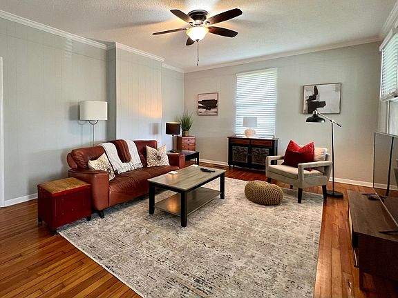 Spacious and cozy living room with smart TV