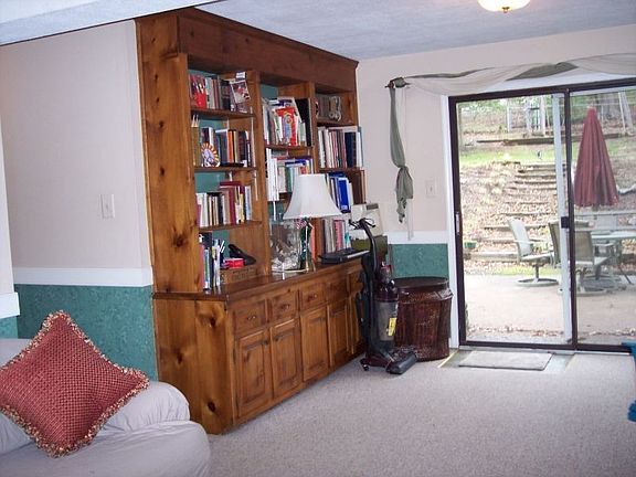 Huge family room with built-ins and fireplace which has gas logs!  