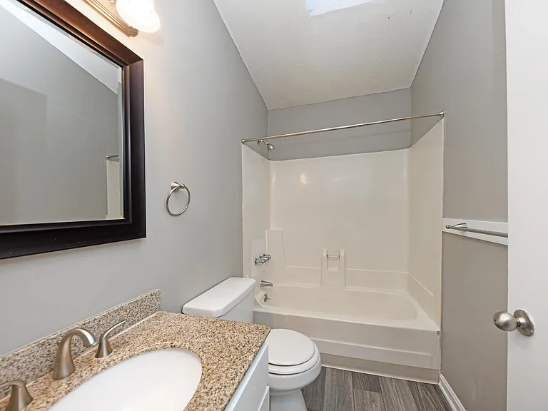 Spacious Bathroom + Granite Counters