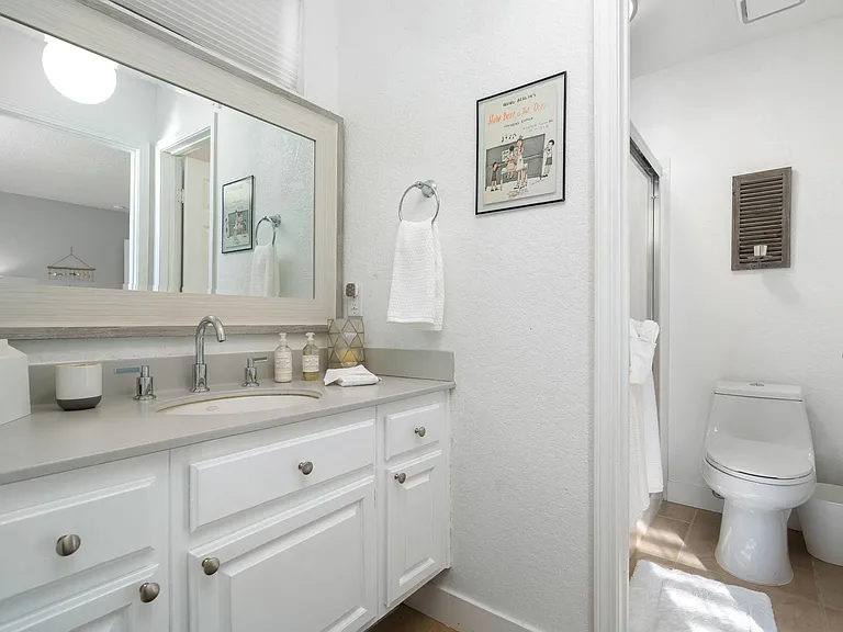 Bath for room with full size bed.