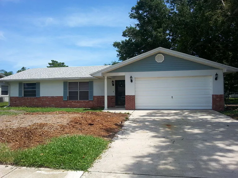 Front house 2 car garage