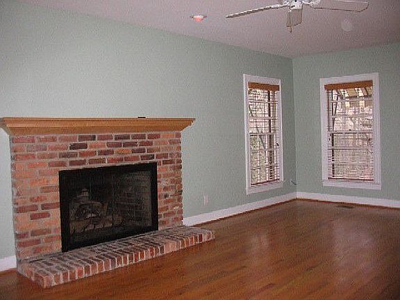 Family room has fireplace with gas logs