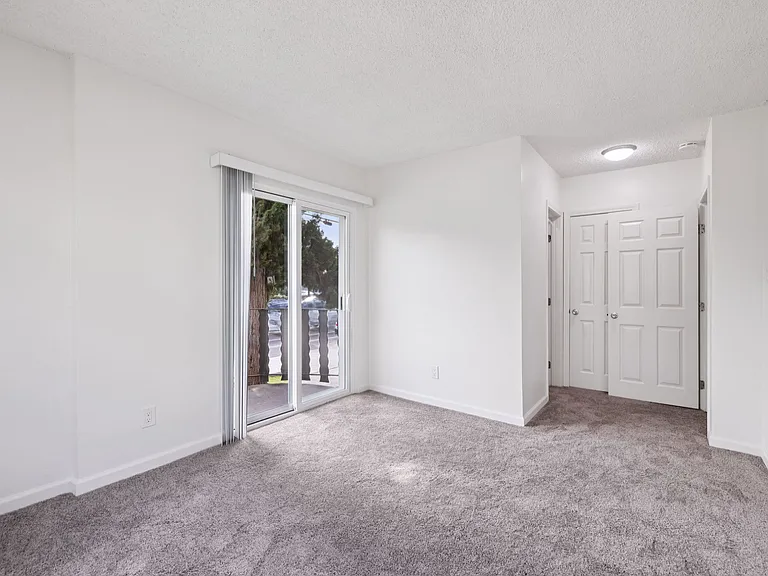 Sunny bedrom with private balcony