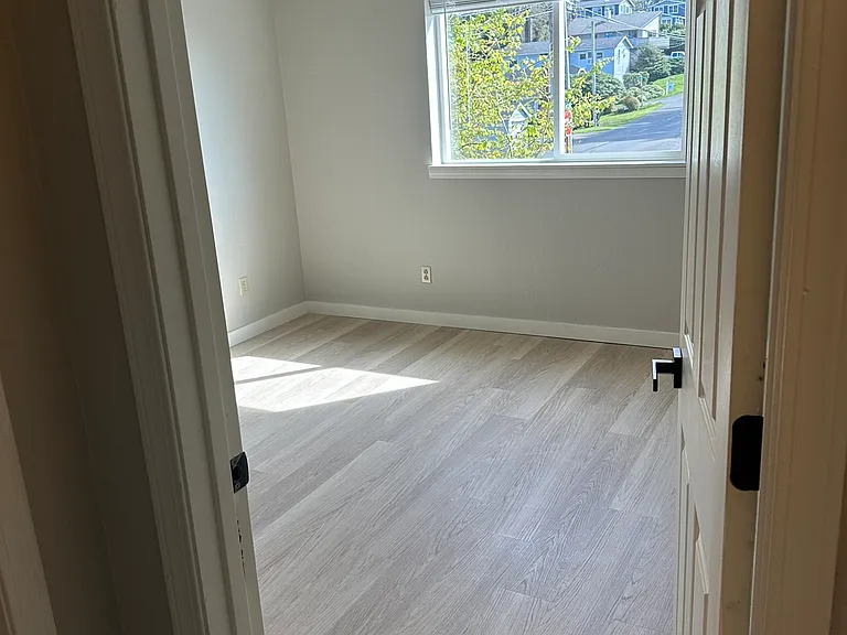 Bedroom #3 with ample natural and shades