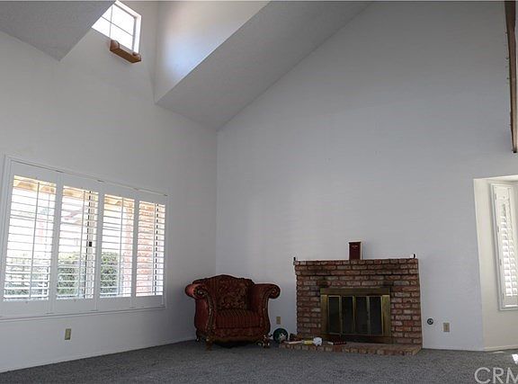 FORMAL LIVING ROOM WITH PLANTATION SHUTTER