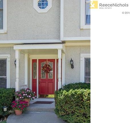 This spacious 5-bedroom two story is on a culdesac lot, nestled into the woods.