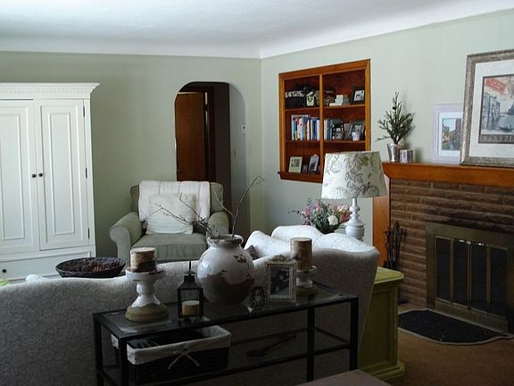 Brick fireplace warms up the open living and dining area 