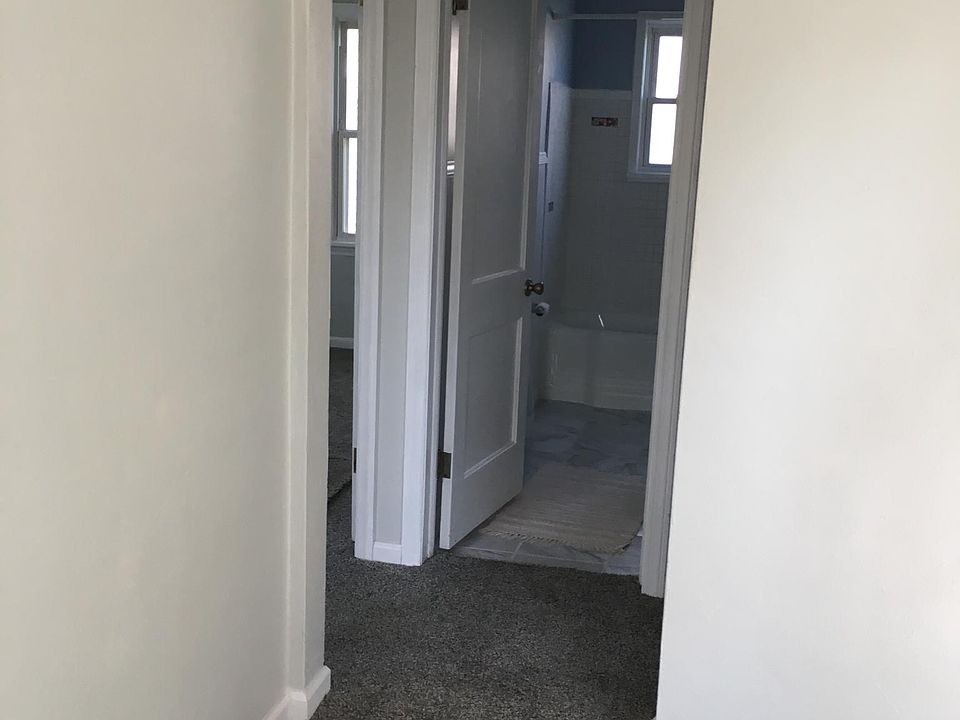 Hallway from living room to bedrooms and bath