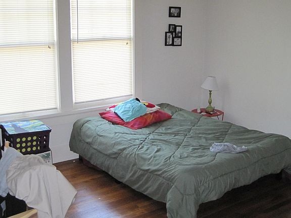 One of the sunny bedrooms