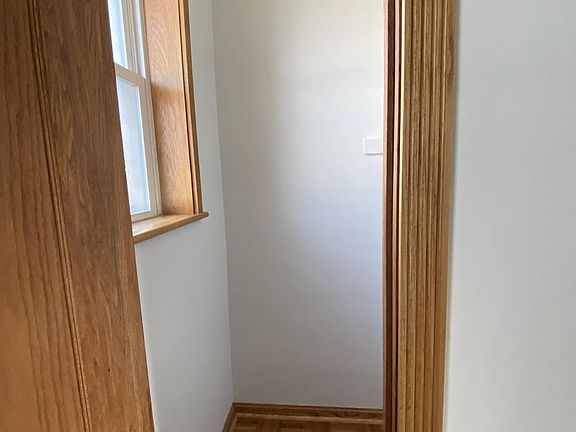 Closet Bedroom #2 near dining. Small window in closet, no switch.