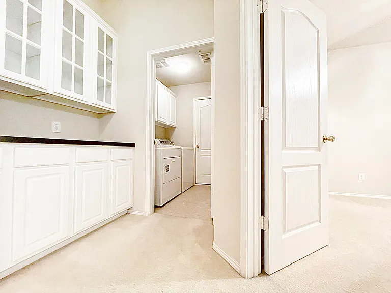LOTS OF STORAGE and Laundry Room