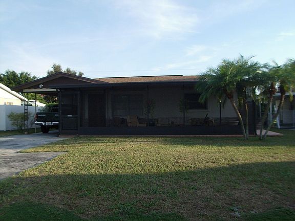 Carport and screened in entry