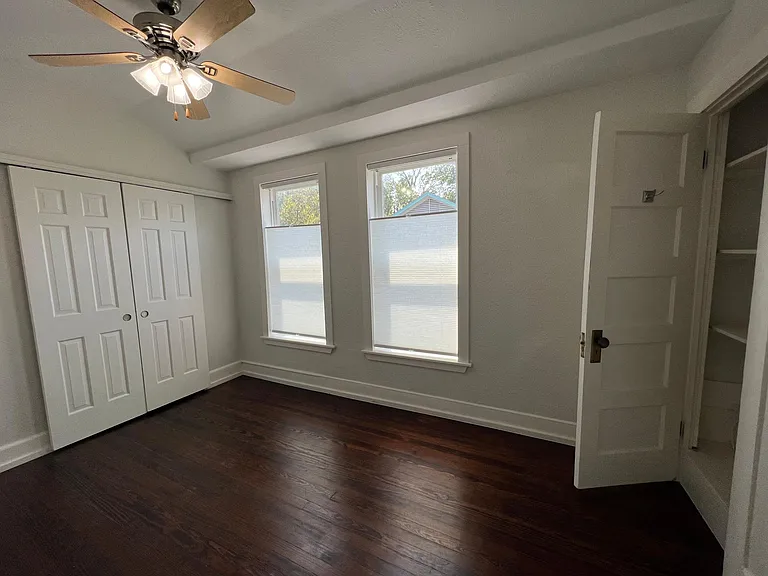 2nd bedroom with 2 closets, new blinds and great hardwoods and courtyard view