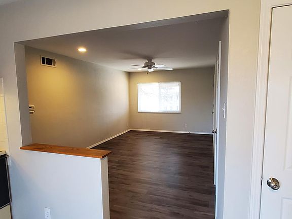 View of living room from Kitchen. (Pantry to the right)