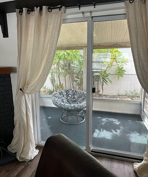 View to second private lanai off main living room of Apt B
