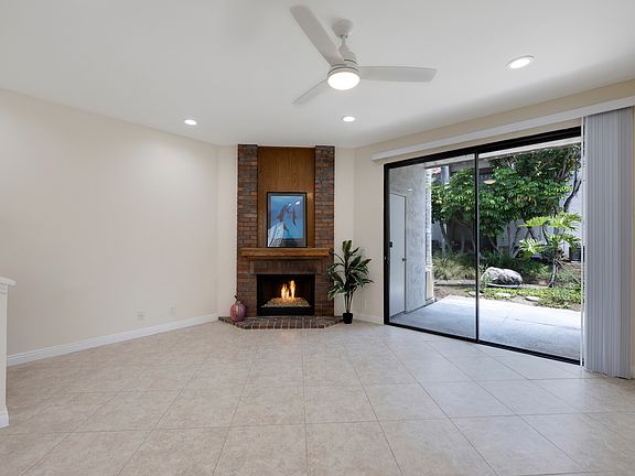 living room, opens to patio