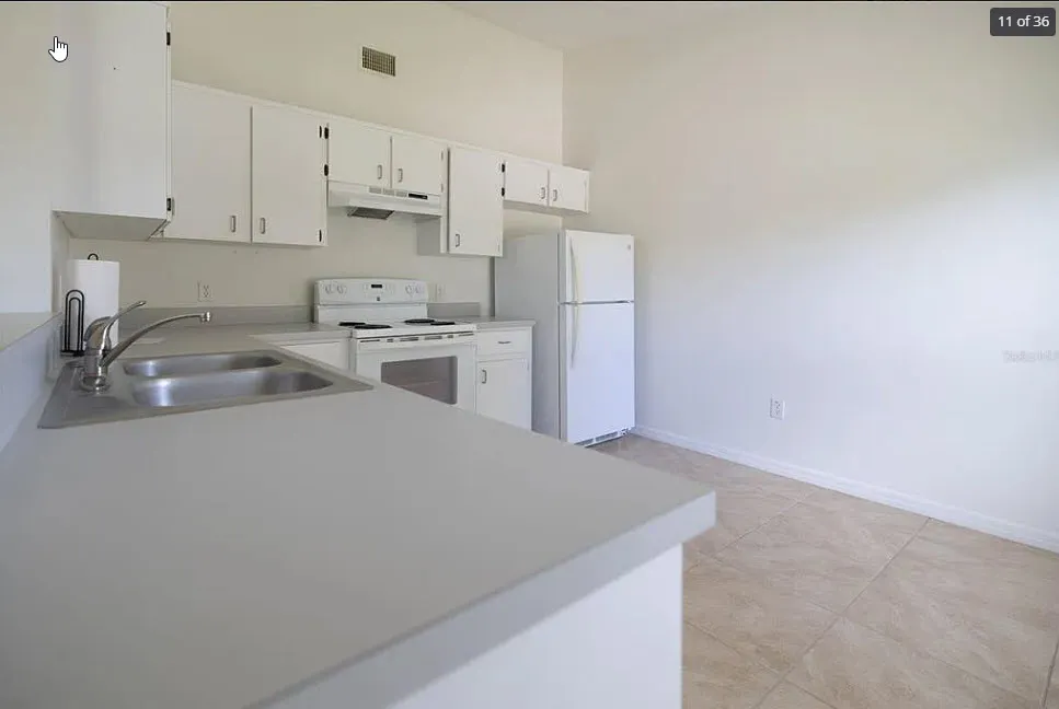 Peeking into the kitchen from the front door entrance - 2318 India Palm Dr #2318