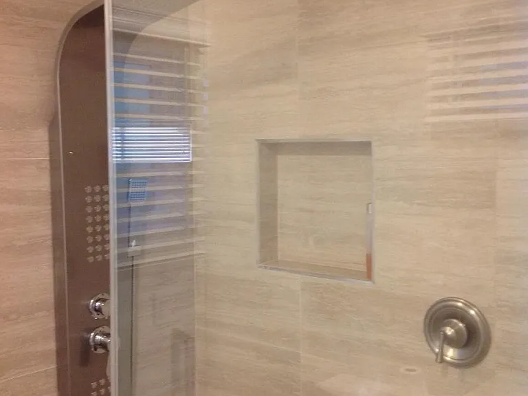 8 Foot Tiled Car Wash Shower in Master Bedroom