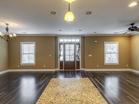 dining area on left, living room on right- view from kitchen