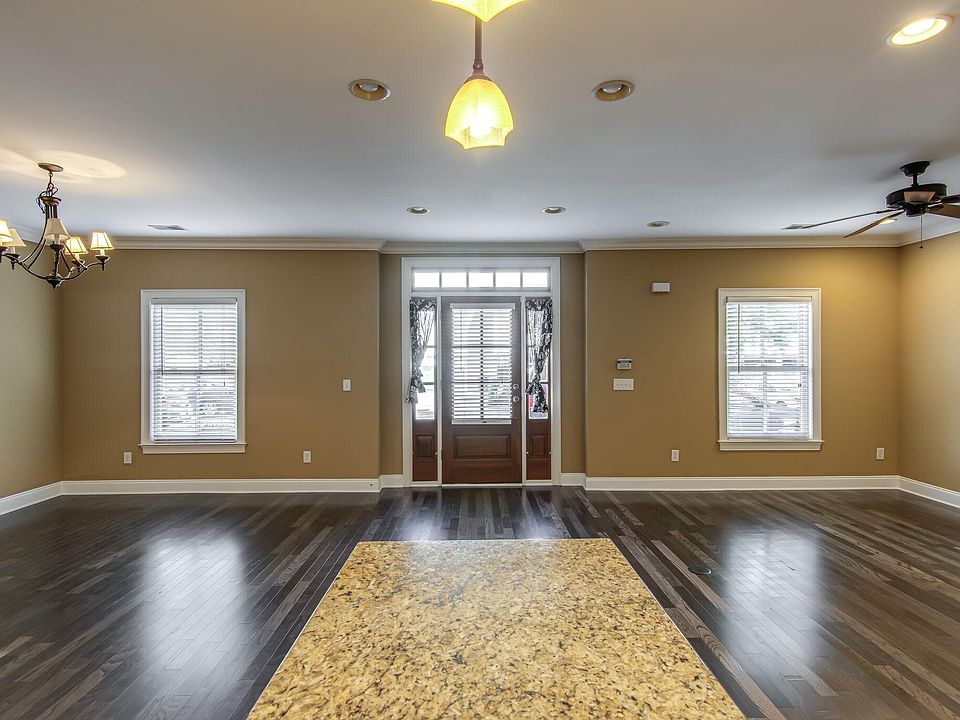 dining area on left, living room on right- view from kitchen