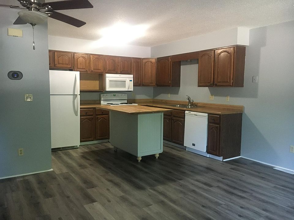 Spacious kitchen with center island and seamless open floor plan_perfect for cooking, entertaining, or relaxing with loved ones just steps away in the connected living area.
