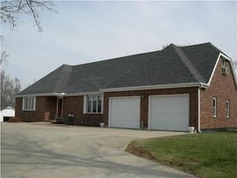 BRICK STORY AND HALF ON 4.27 ACRES