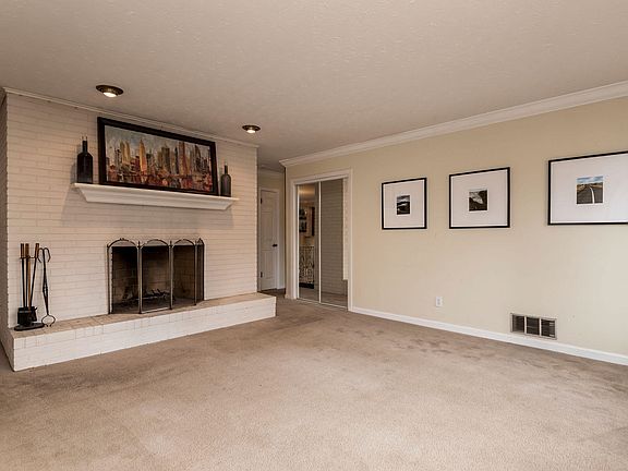 Family Room w/ Wood Burning Fireplace