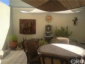 Patio - table and sunguard will remain.