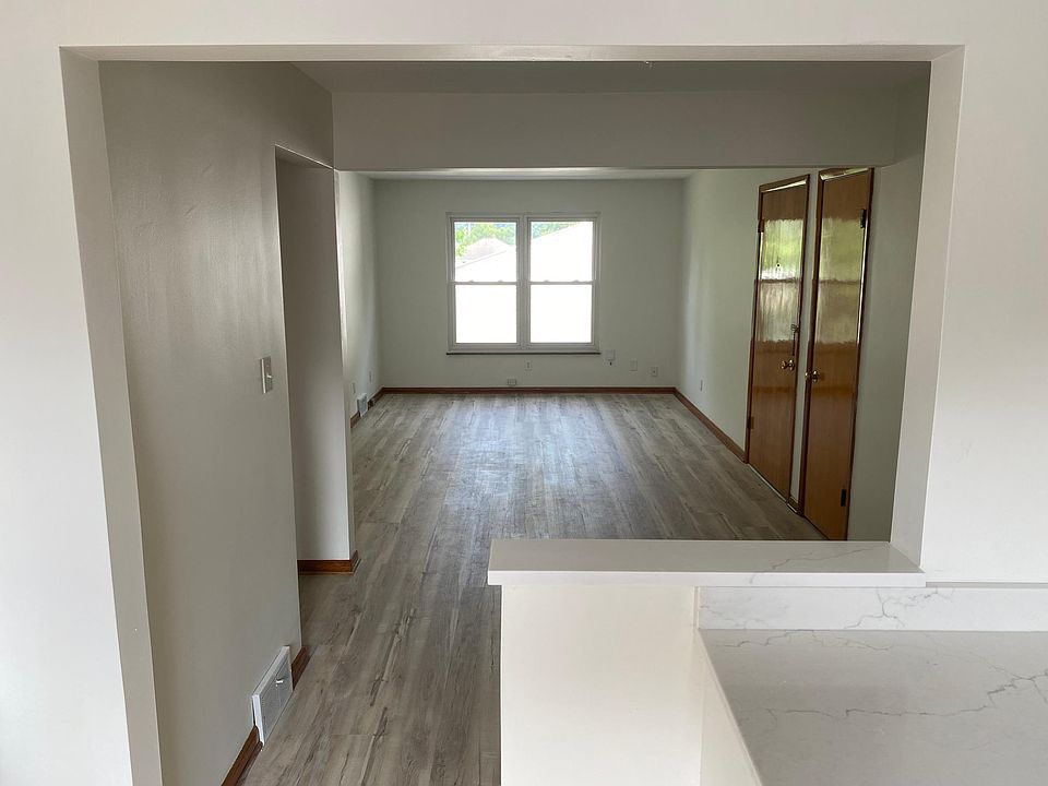 Kitchen overlooks dining and living area